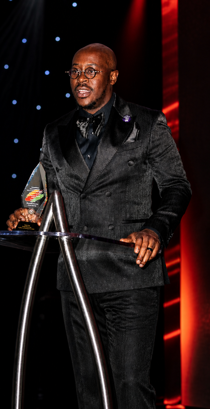 Deondra Randle accepting an award on stage